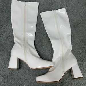 White boots (fall just below the knee)